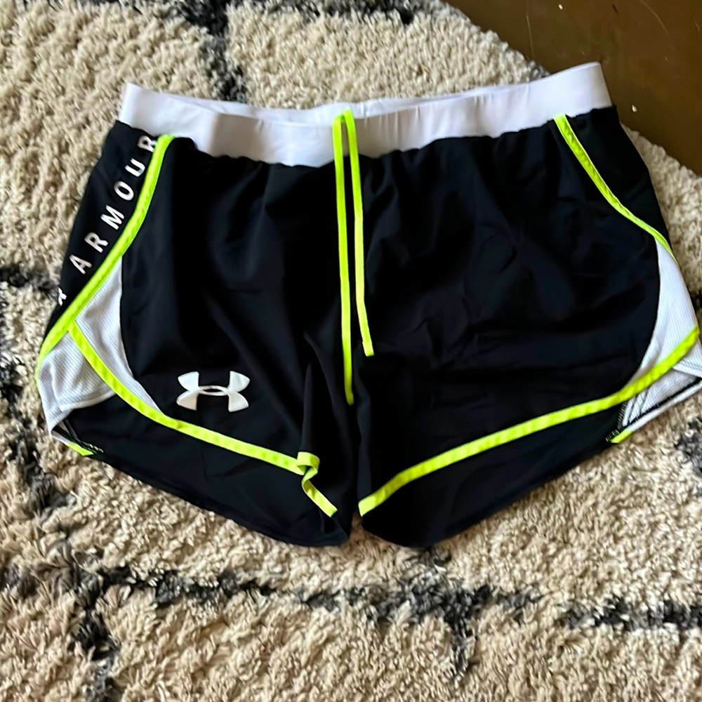Under Armour highlighter yellow and black running shorts